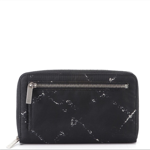 Chanel travel zip around wallet in printed nylon. - Picture 2 of 6